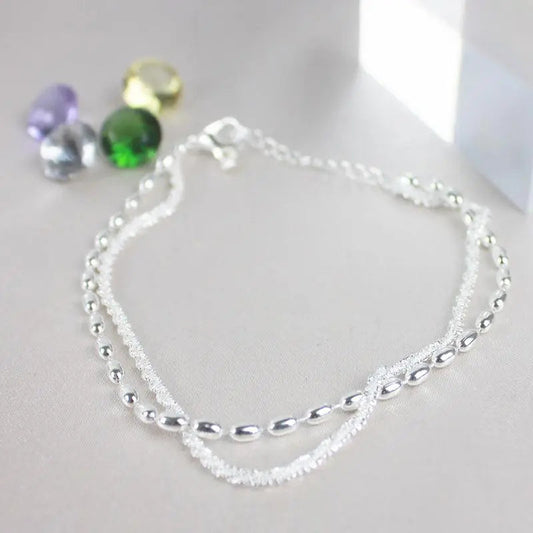Amparo - Set di Eleganti Braccialetti Argentati con Pietre di Zirconia