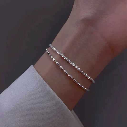 Amparo - Set di Eleganti Braccialetti Argentati con Pietre di Zirconia